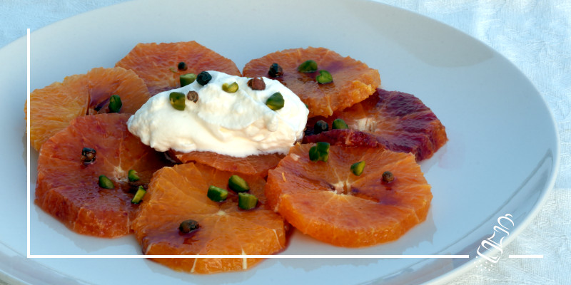 orangendessert mit pfeffer und pistazien